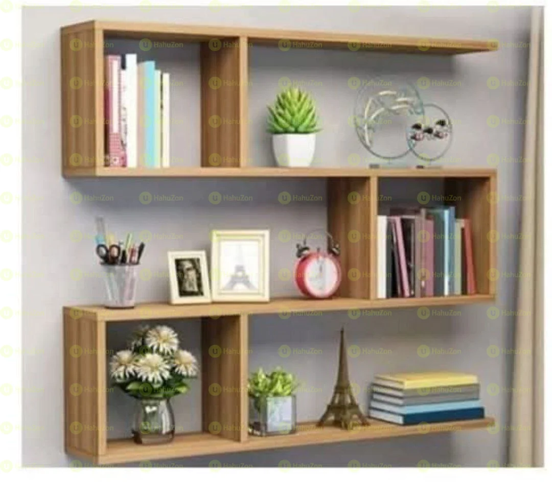 ግድግዳ ላይ የሚለጠፉ መጸሃፍ መደርደሪያ