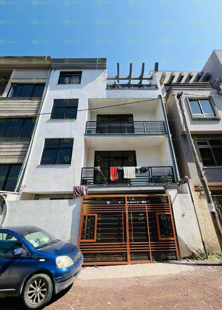 72 ካሬ የሚሸጥ G+3  ቤት በሀይሌ ጋርመንት