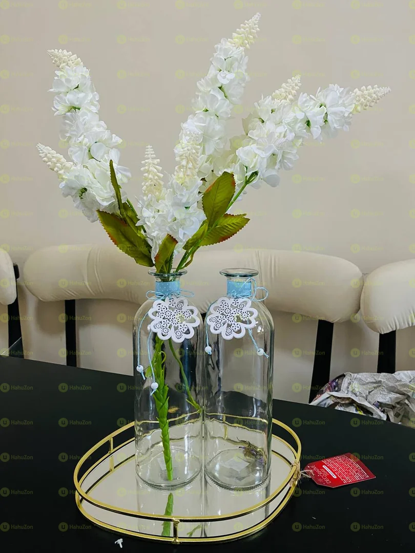 Clear Vase with Long White Flower