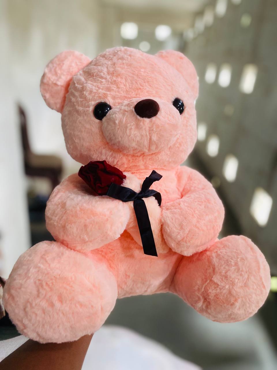 ባለ አበባ ተቀማጭ ፈር አሻንጉሊት