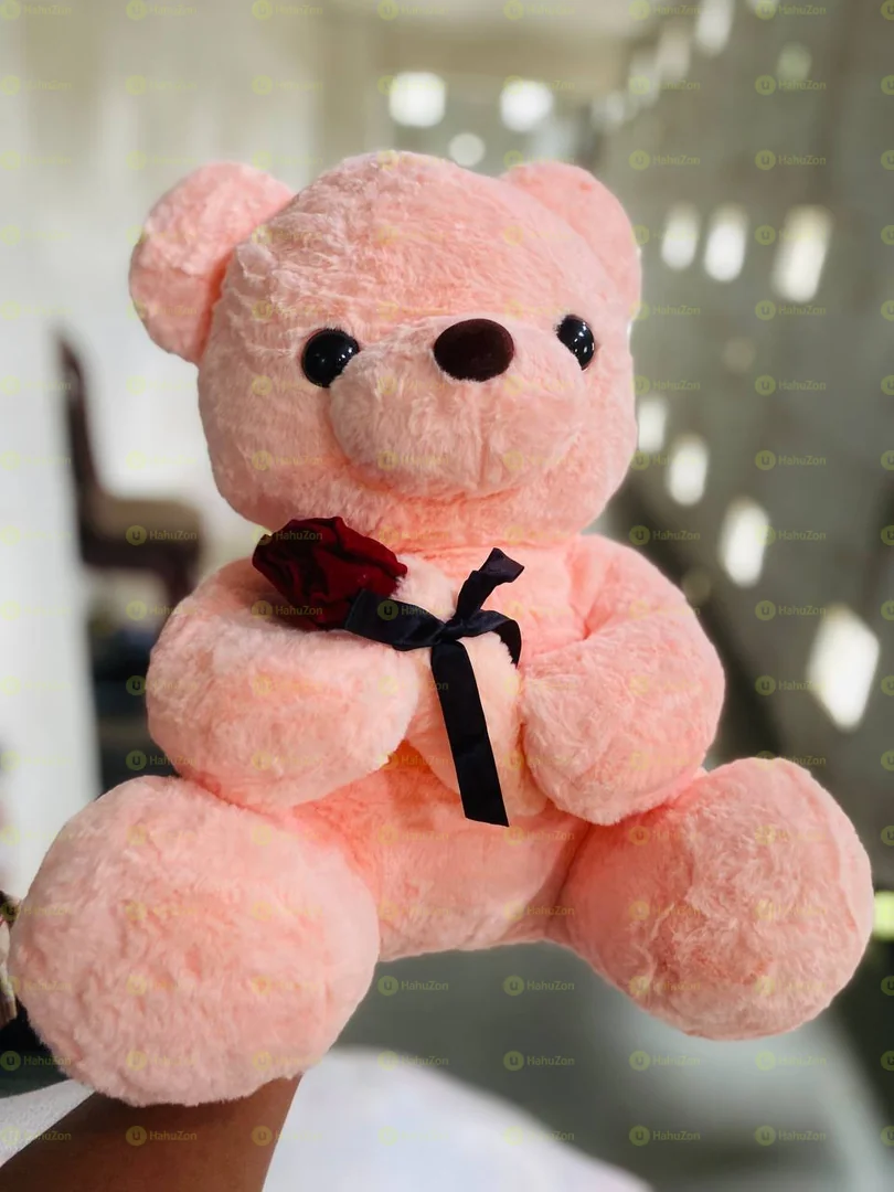 ባለ አበባ ተቀማጭ ፈር አሻንጉሊት