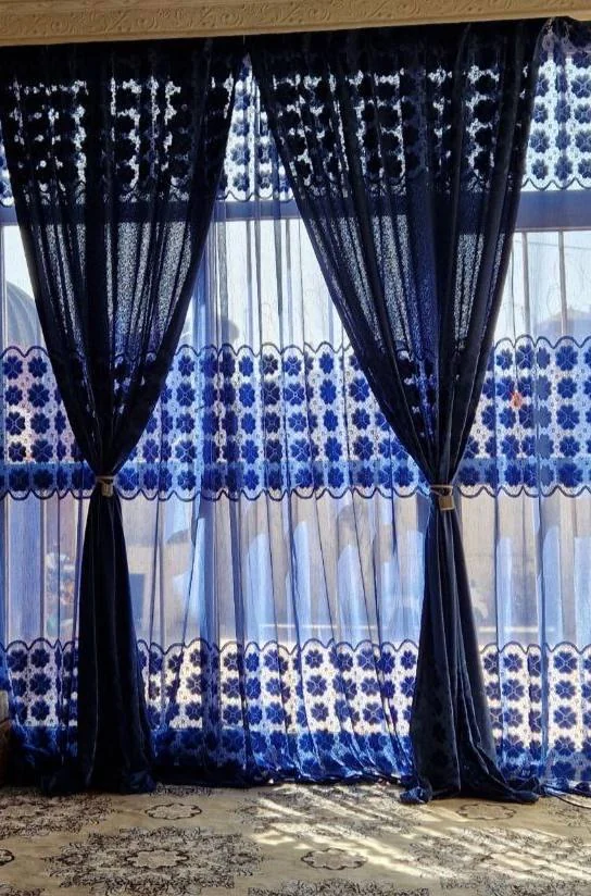 ባለ ሁለት ተደራቢ መጋረጃ