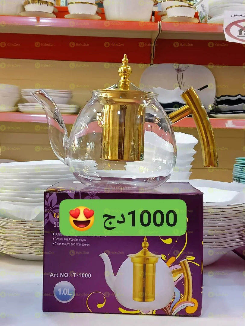 ባለ መስታወት የሻይ ማንቆርቆሪያ