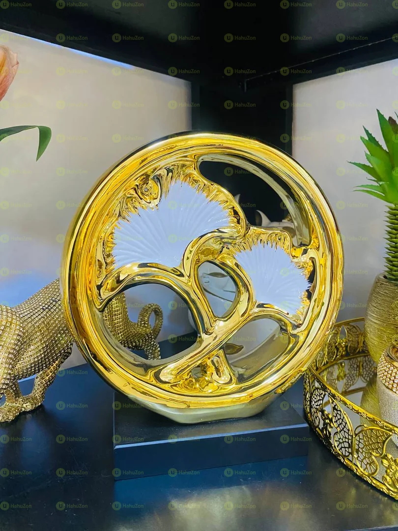 Modern White and Golden Sculpture