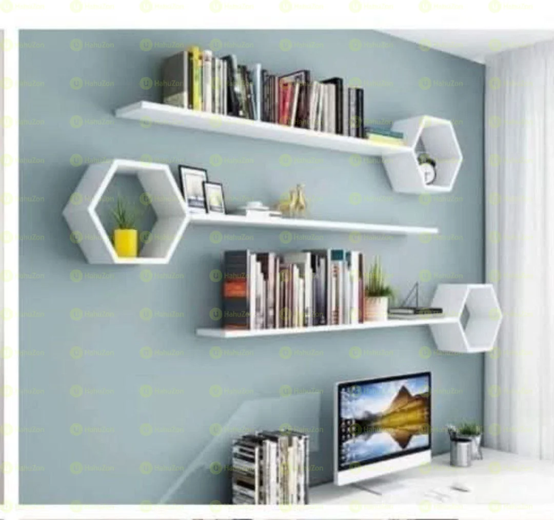 ግድግዳ ላይ የሚለጠፉ መጸሃፍ መደርደሪያ