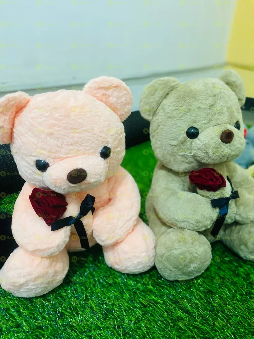 ባለ አበባ ተቀማጭ ፈር አሻንጉሊት